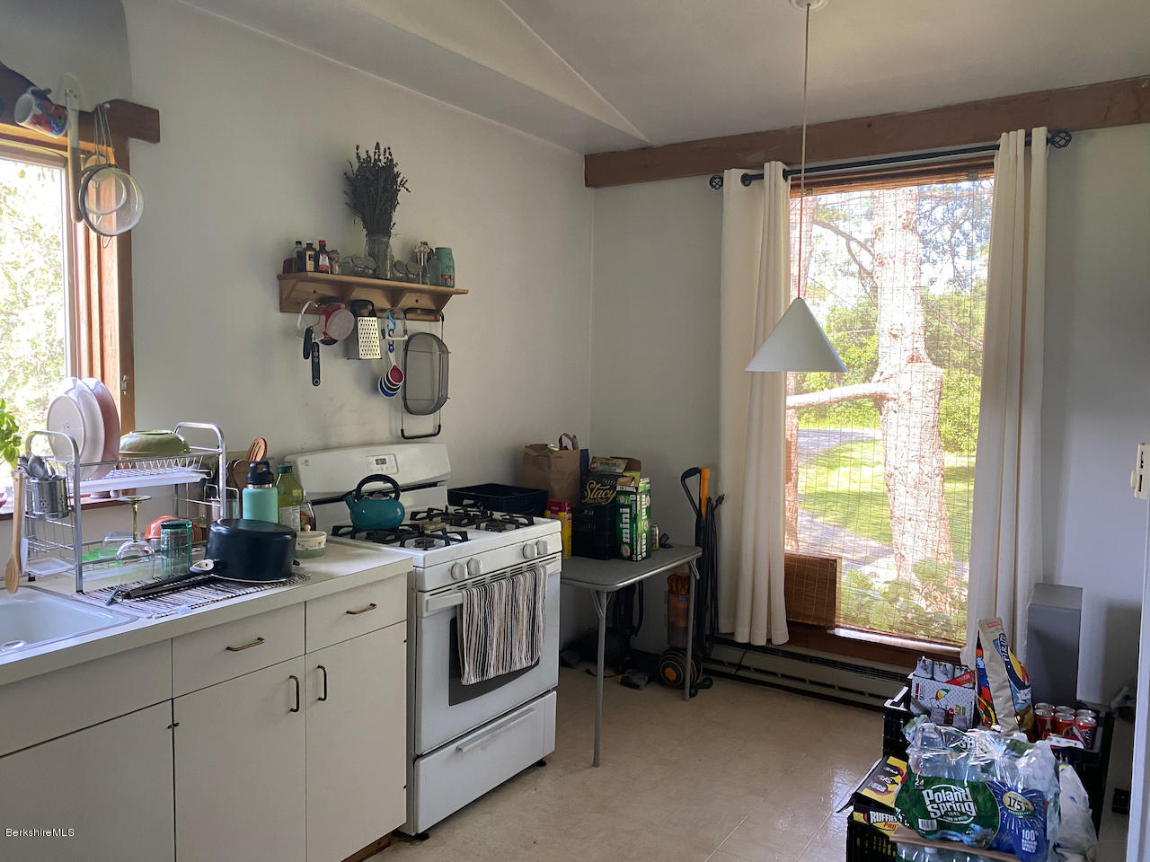 30 Prospect Hill Road Stockbridge, MA 01262 - Photo 8 of 19 a kitchen with a stove a sink and a window