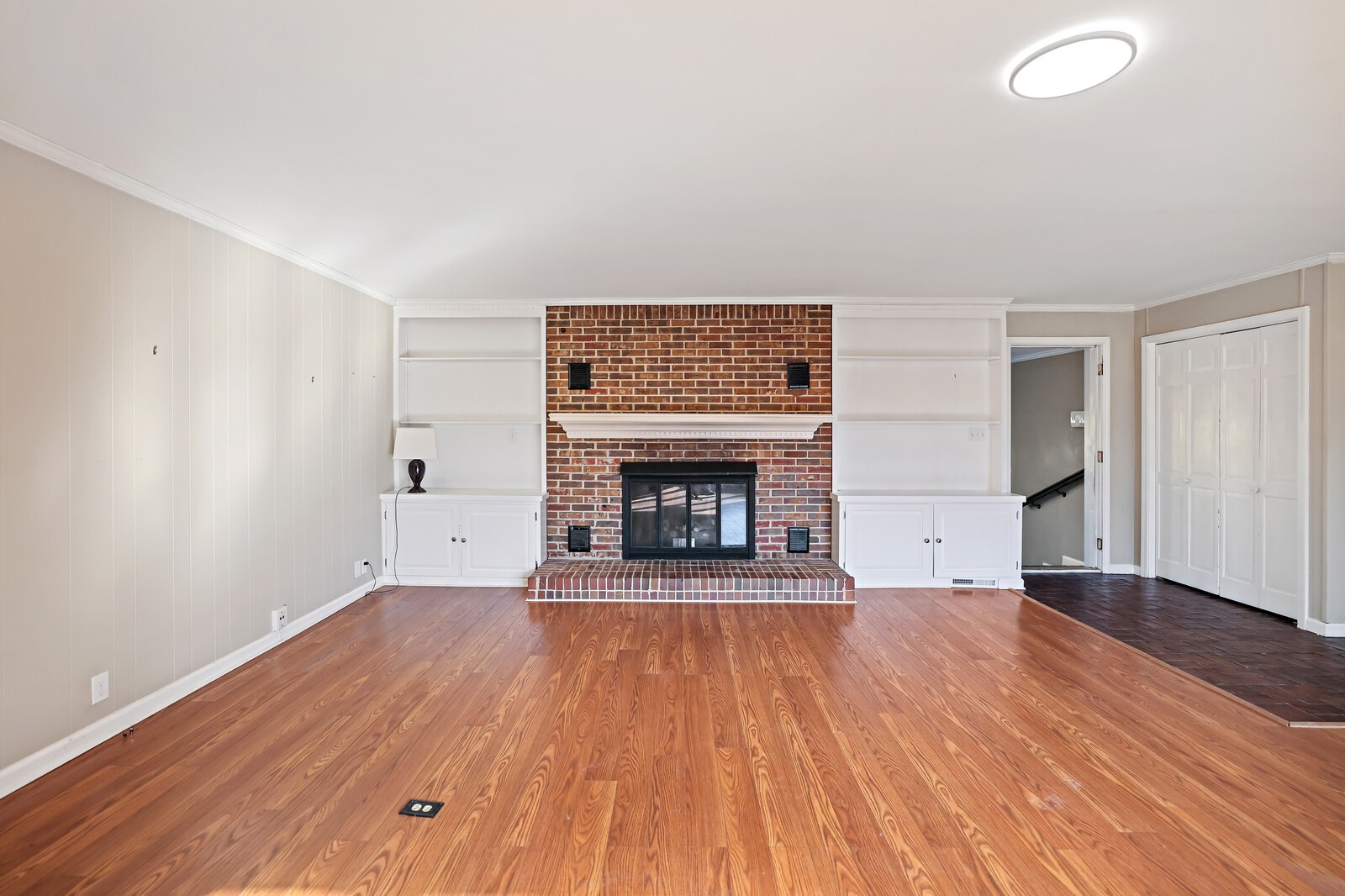 220 Hampton Road Columbia, TN 38401 - Photo 11 of 74 a view of an empty room with wooden floor fireplace and a window