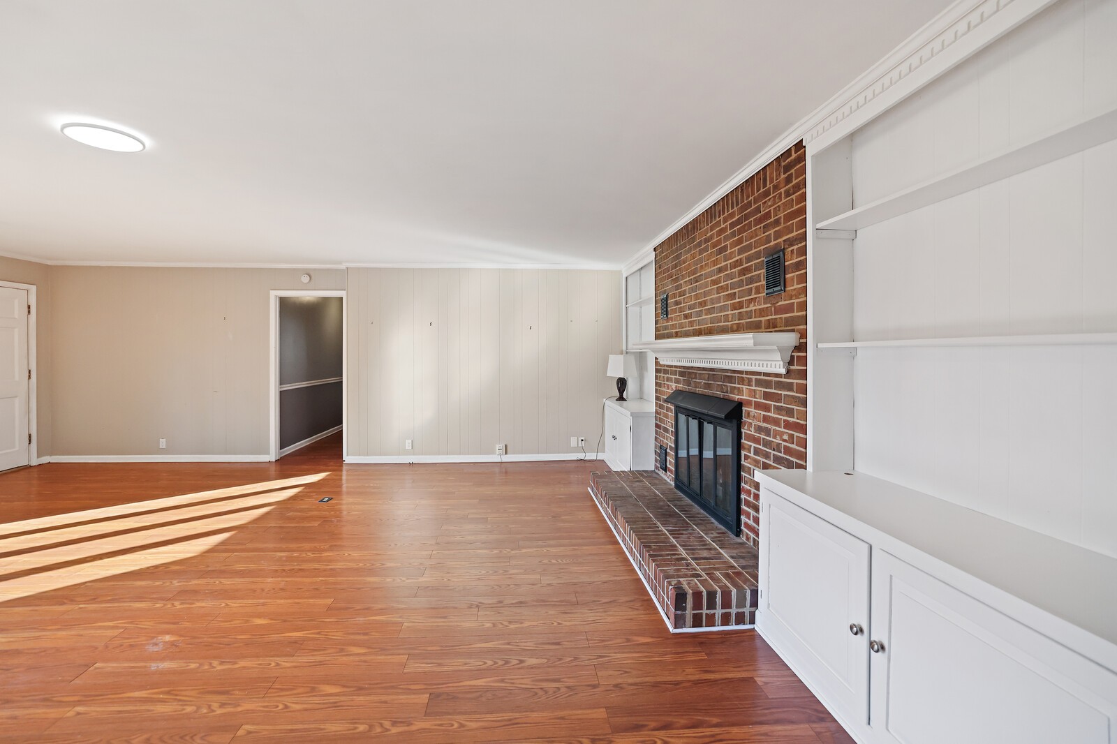 220 Hampton Road Columbia, TN 38401 - Photo 14 of 74 a view of a livingroom with an empty space and a fireplace