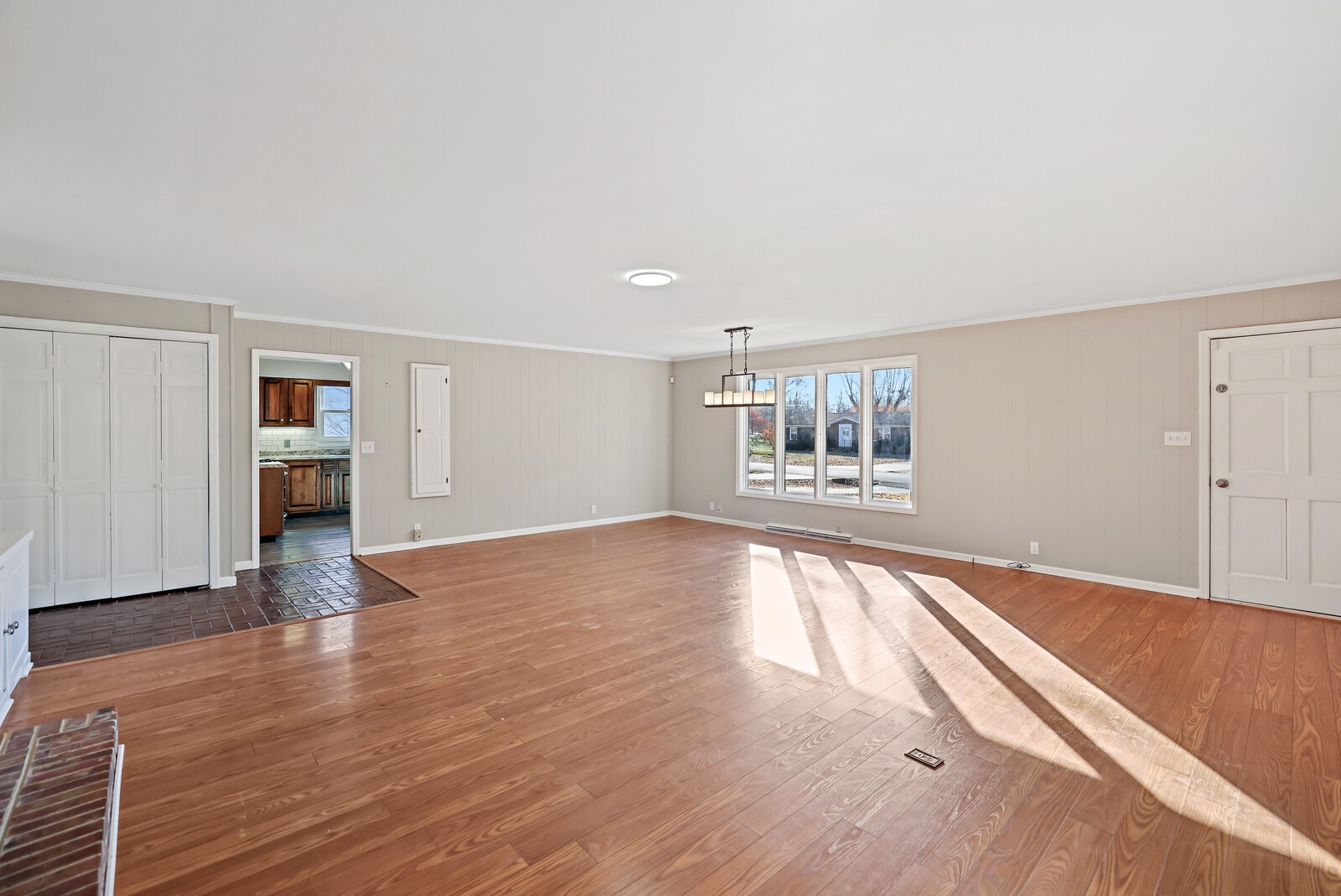 220 Hampton Road Columbia, TN 38401 - Photo 16 of 74 a view of an empty room with a window and wooden floor