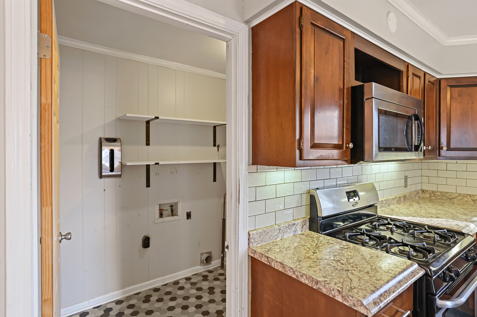 220 Hampton Road Columbia, TN 38401 - Photo 25 of 74 a kitchen with stainless steel appliances granite countertop a stove and a sink