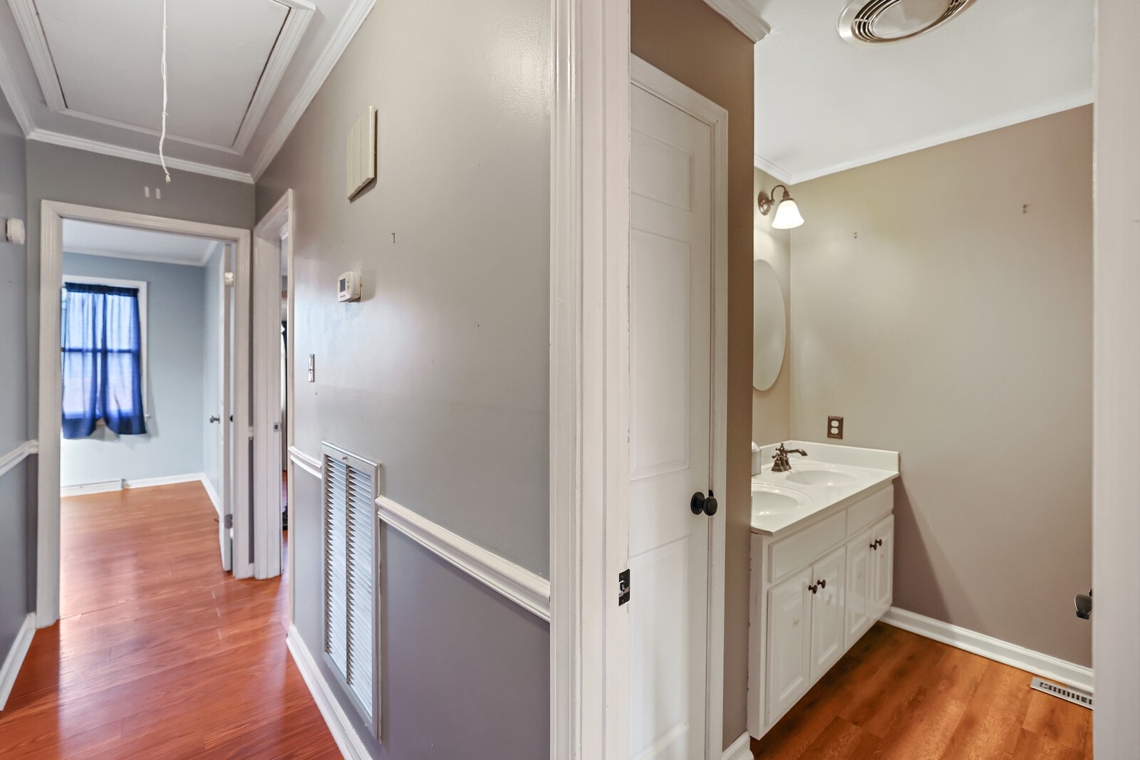 220 Hampton Road Columbia, TN 38401 - Photo 29 of 74 a view of a hallway with wooden floor and cabinet space