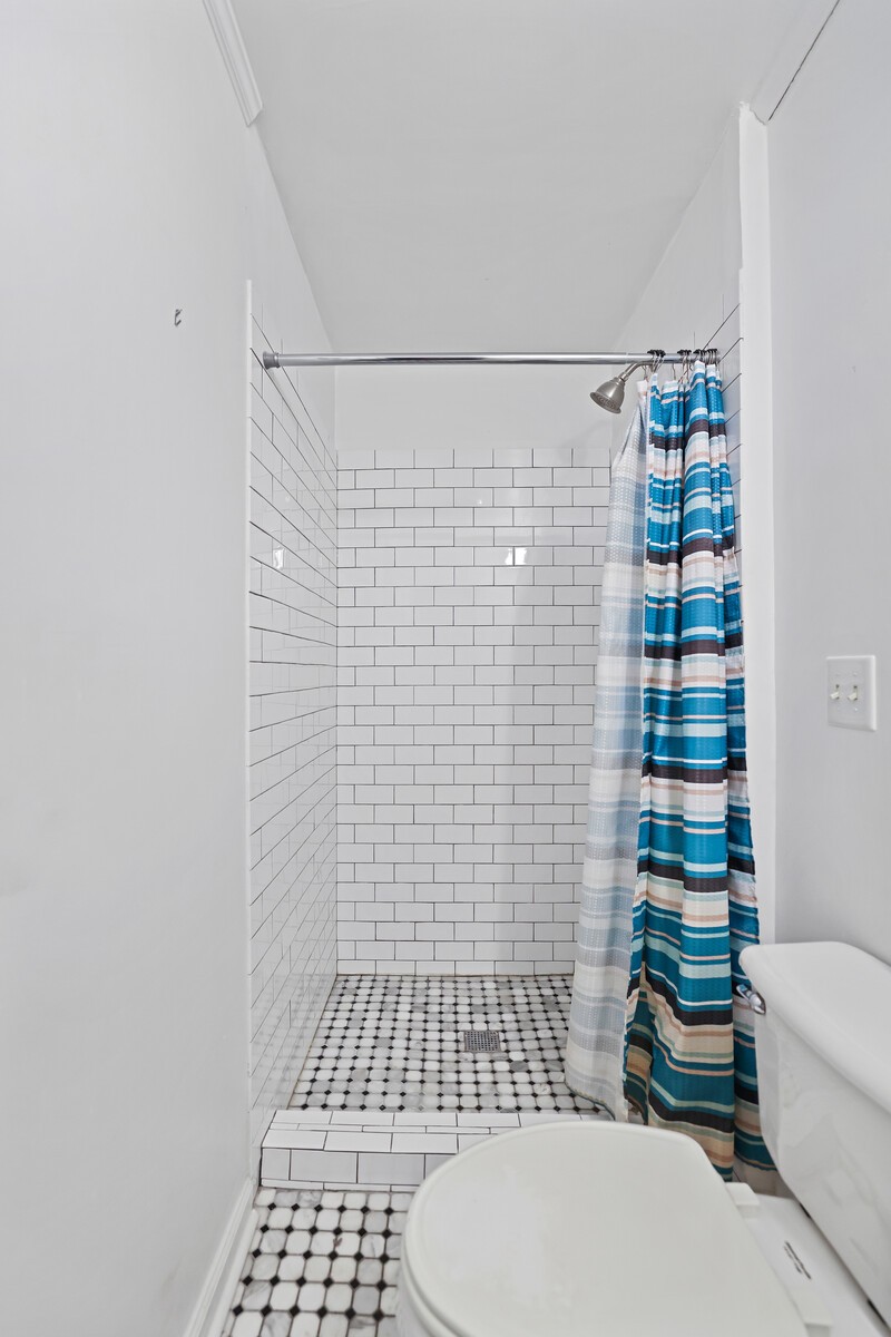 220 Hampton Road Columbia, TN 38401 - Photo 41 of 74 a bathroom with a toilet and a shower