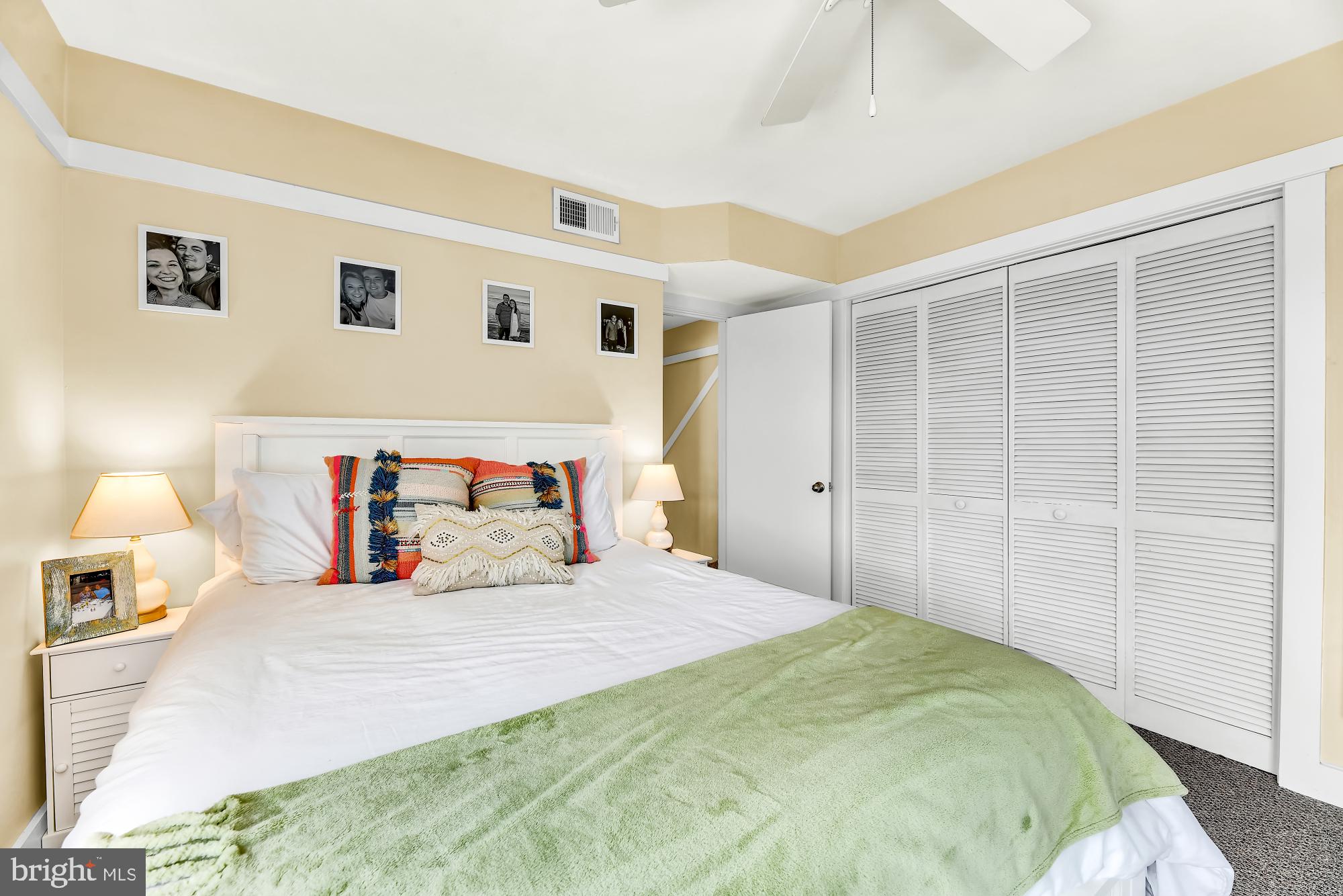 1257 Riverside Avenue, Unit D Baltimore, MD 21230 - Photo 13 of 36 a bedroom with a large bed and a night stand