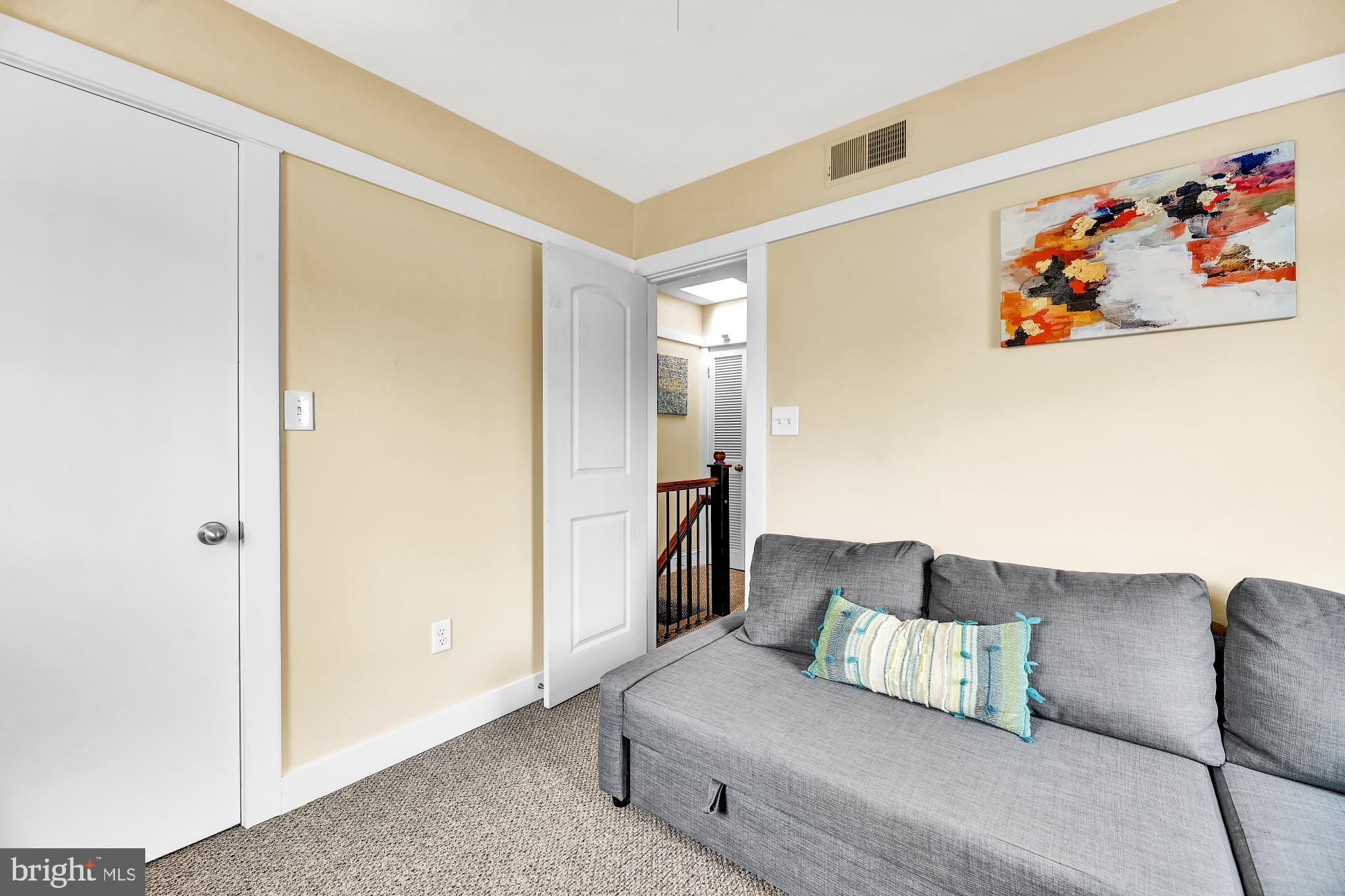 1257 Riverside Avenue, Unit D Baltimore, MD 21230 - Photo 15 of 36 a living room with furniture and a couch