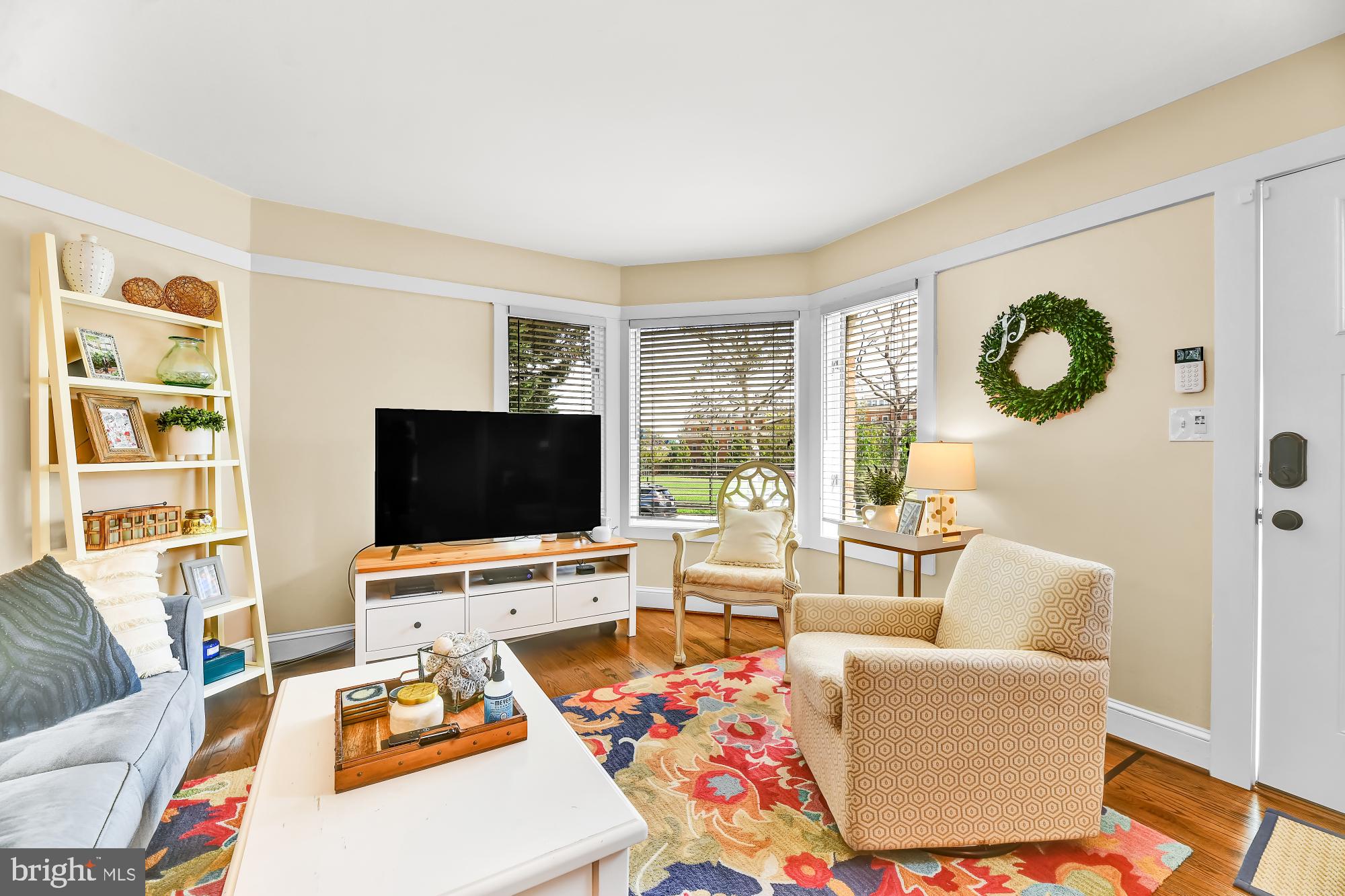 1257 Riverside Avenue, Unit D Baltimore, MD 21230 - Photo 6 of 36 a living room with furniture and a flat screen tv