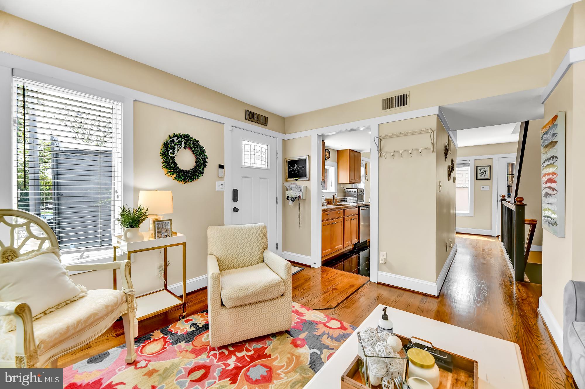 1257 Riverside Avenue, Unit D Baltimore, MD 21230 - Photo 7 of 36 a living room with furniture and a large window