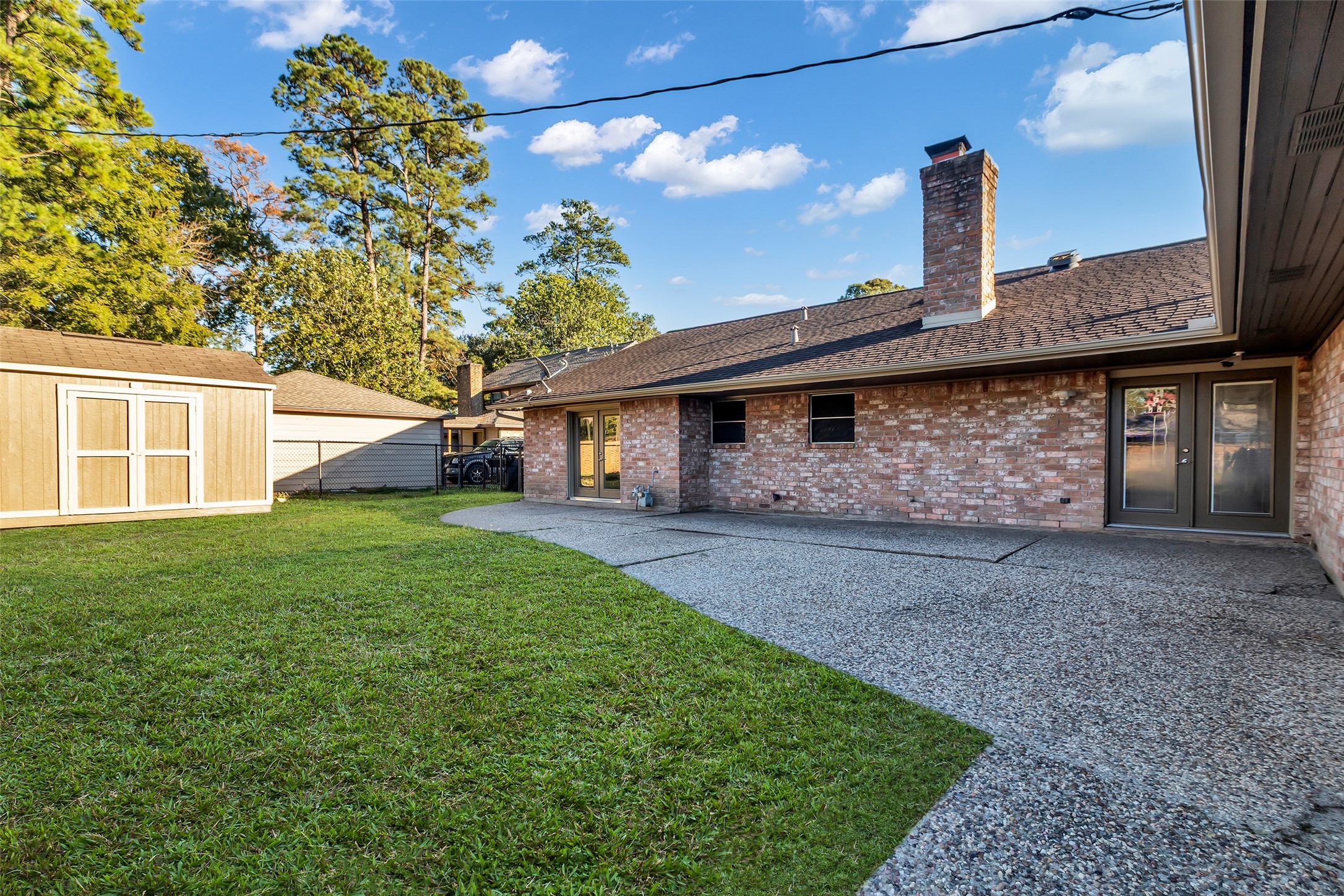 603 St Andrews Road Kingwood, TX 77339 - Photo 12 of 34 a front view of a house with garden