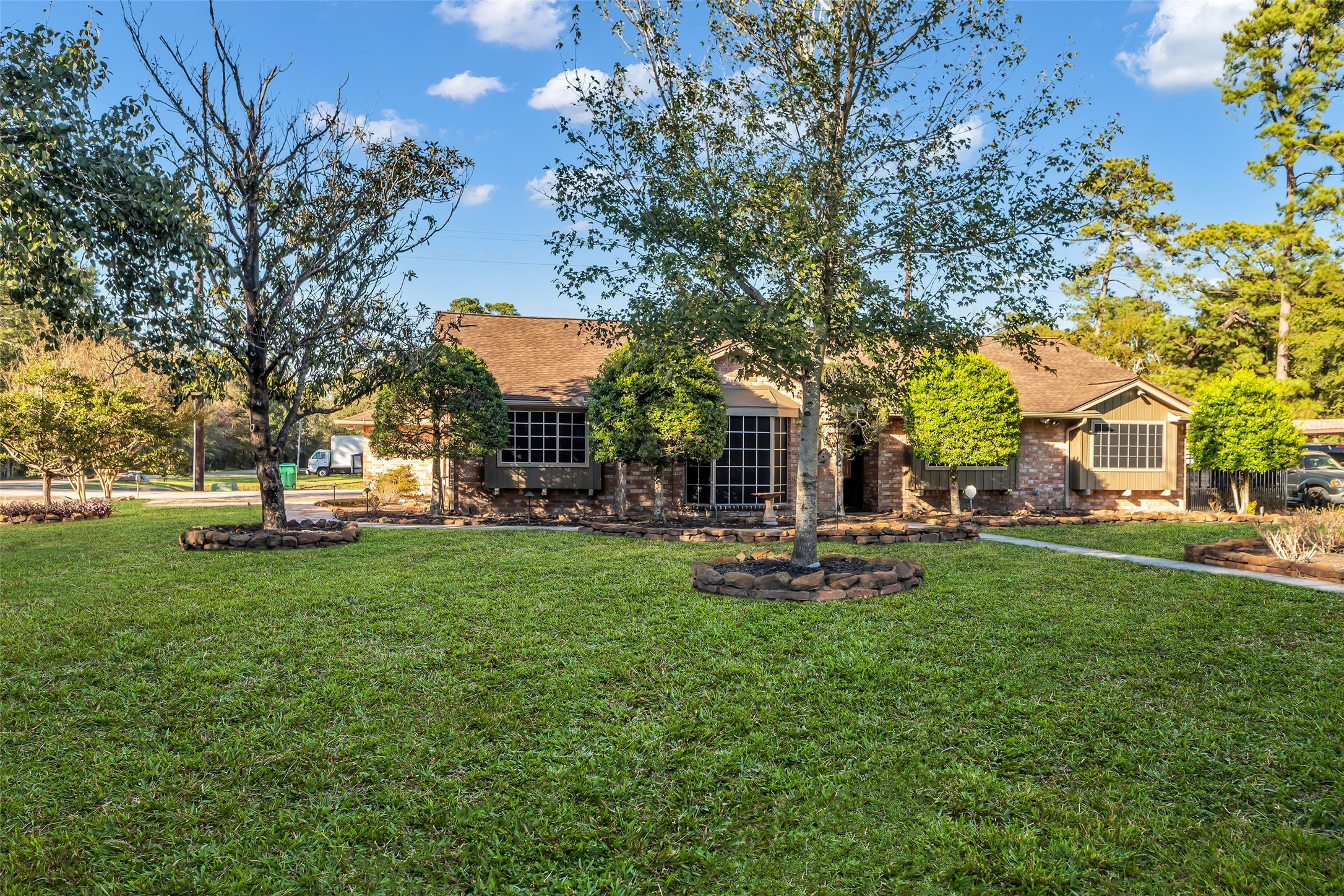 603 St Andrews Road Kingwood, TX 77339 - Photo 14 of 34 a view of a house with backyard and sitting area