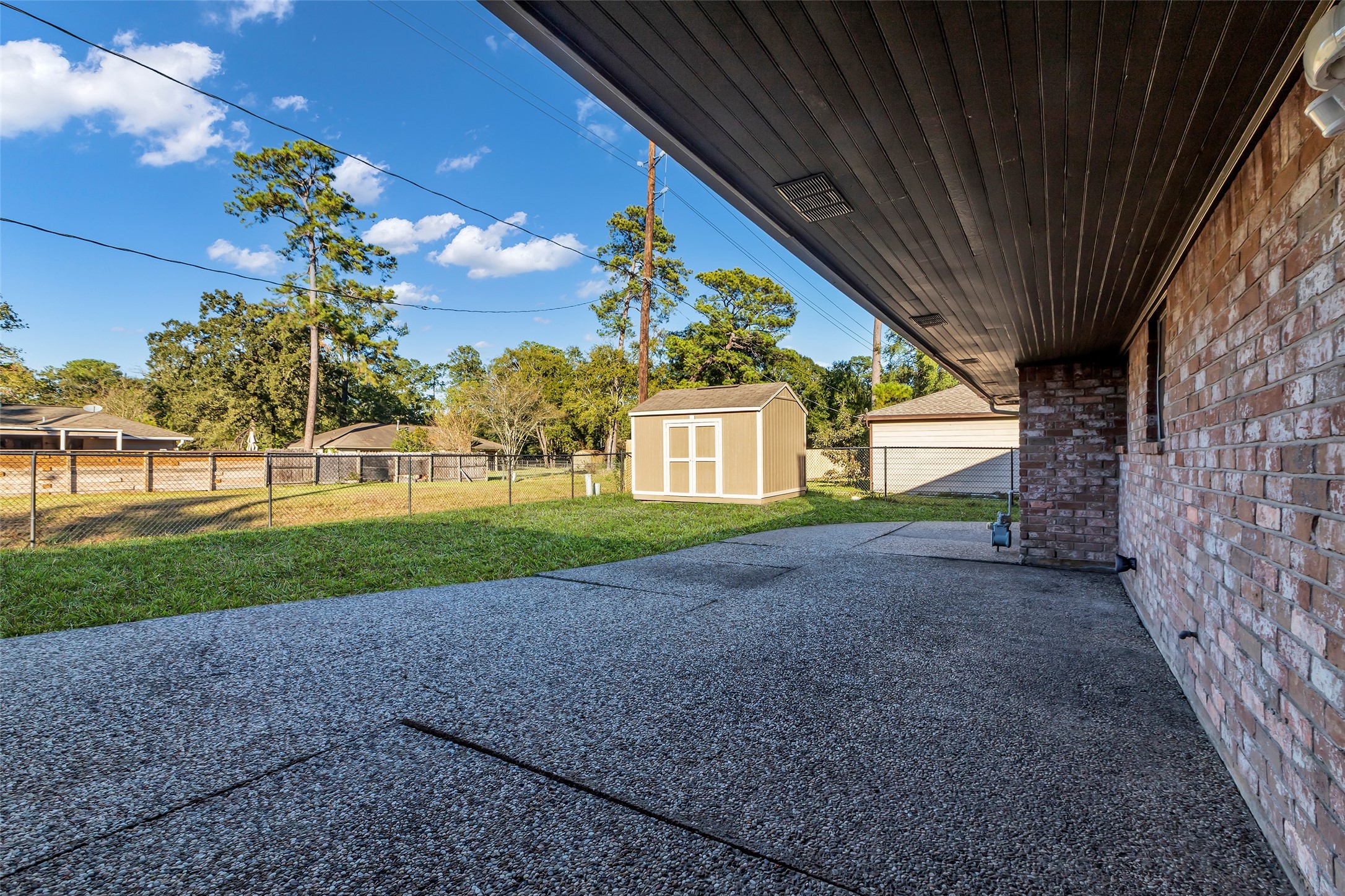 603 St Andrews Road Kingwood, TX 77339 - Photo 27 of 34 a view of a house with a yard