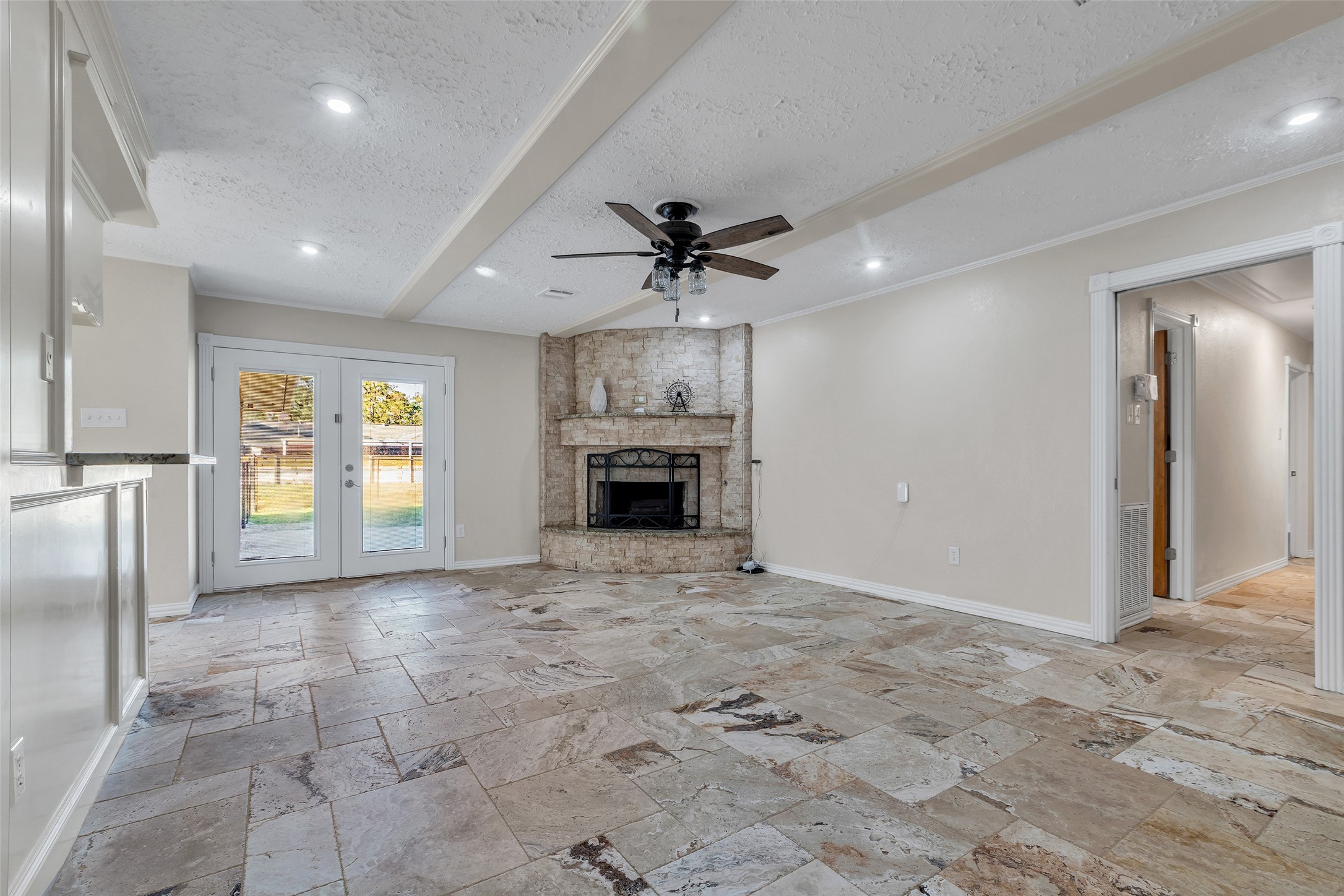 603 St Andrews Road Kingwood, TX 77339 - Photo 4 of 34 a view of an empty room with a fireplace