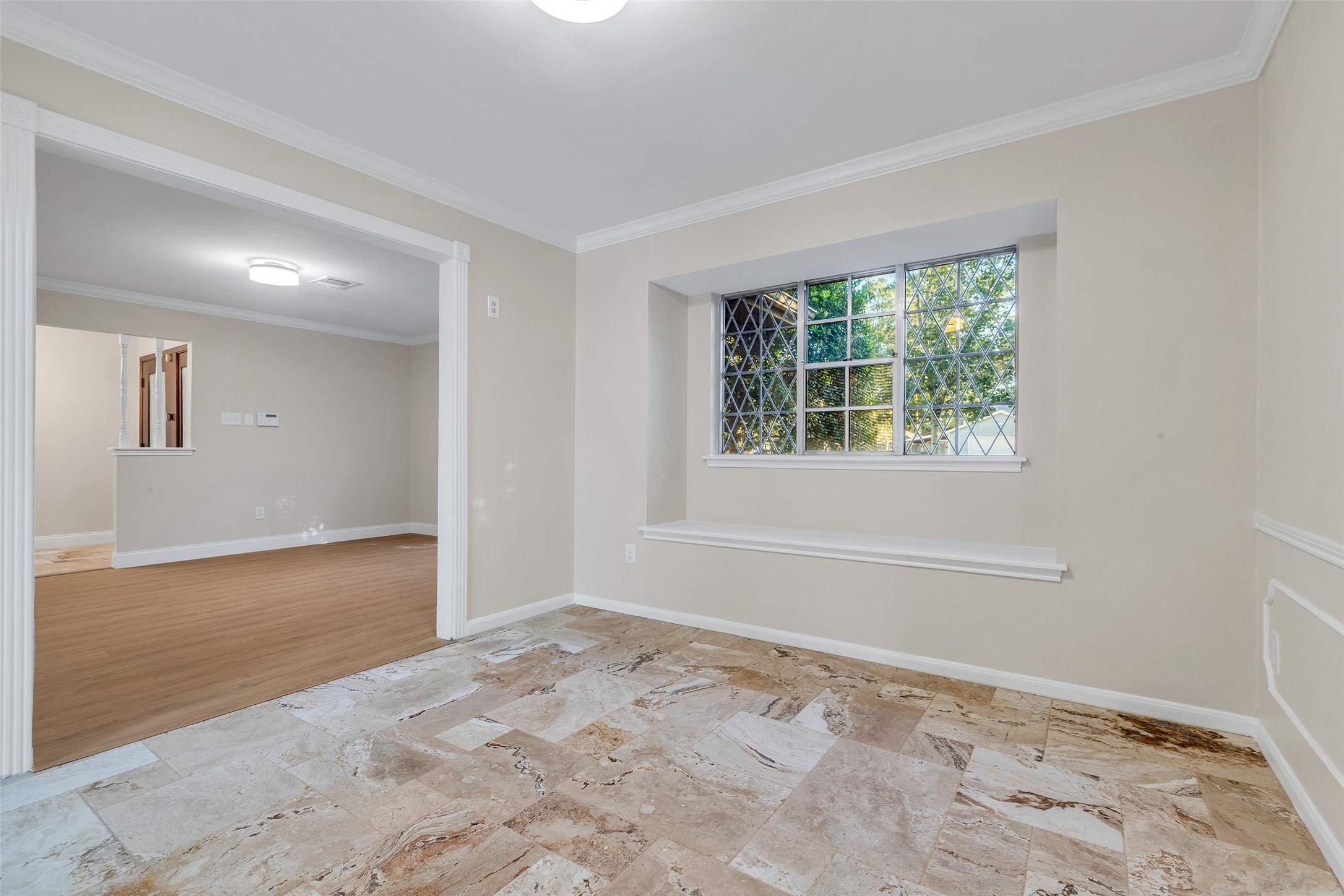 603 St Andrews Road Kingwood, TX 77339 - Photo 9 of 34 a view of a big room with wooden floor and windows