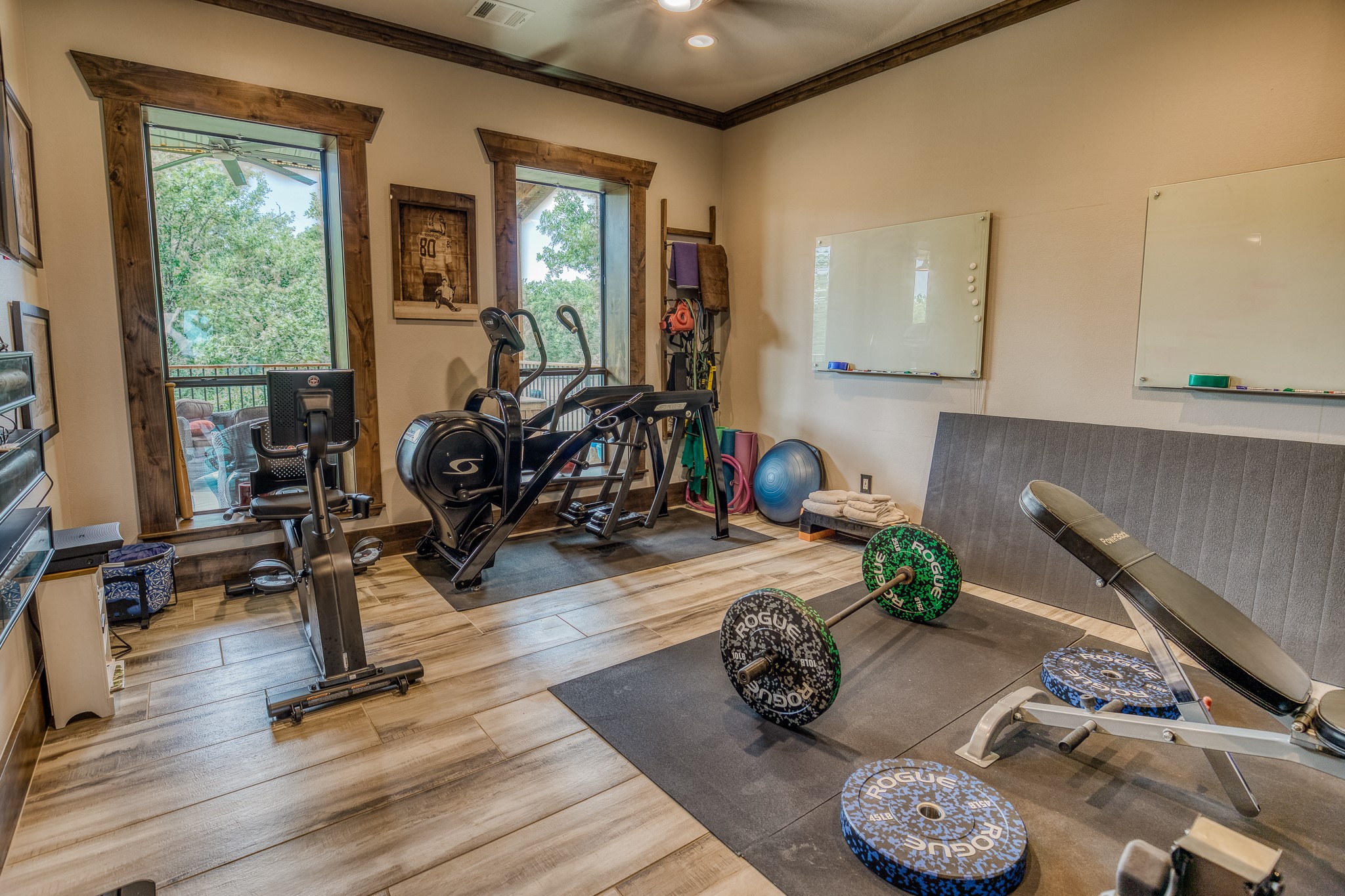 10092 County Road 446 Somerville, TX 77879 - Photo 23 of 50 a room with gym equipment and wooden floor