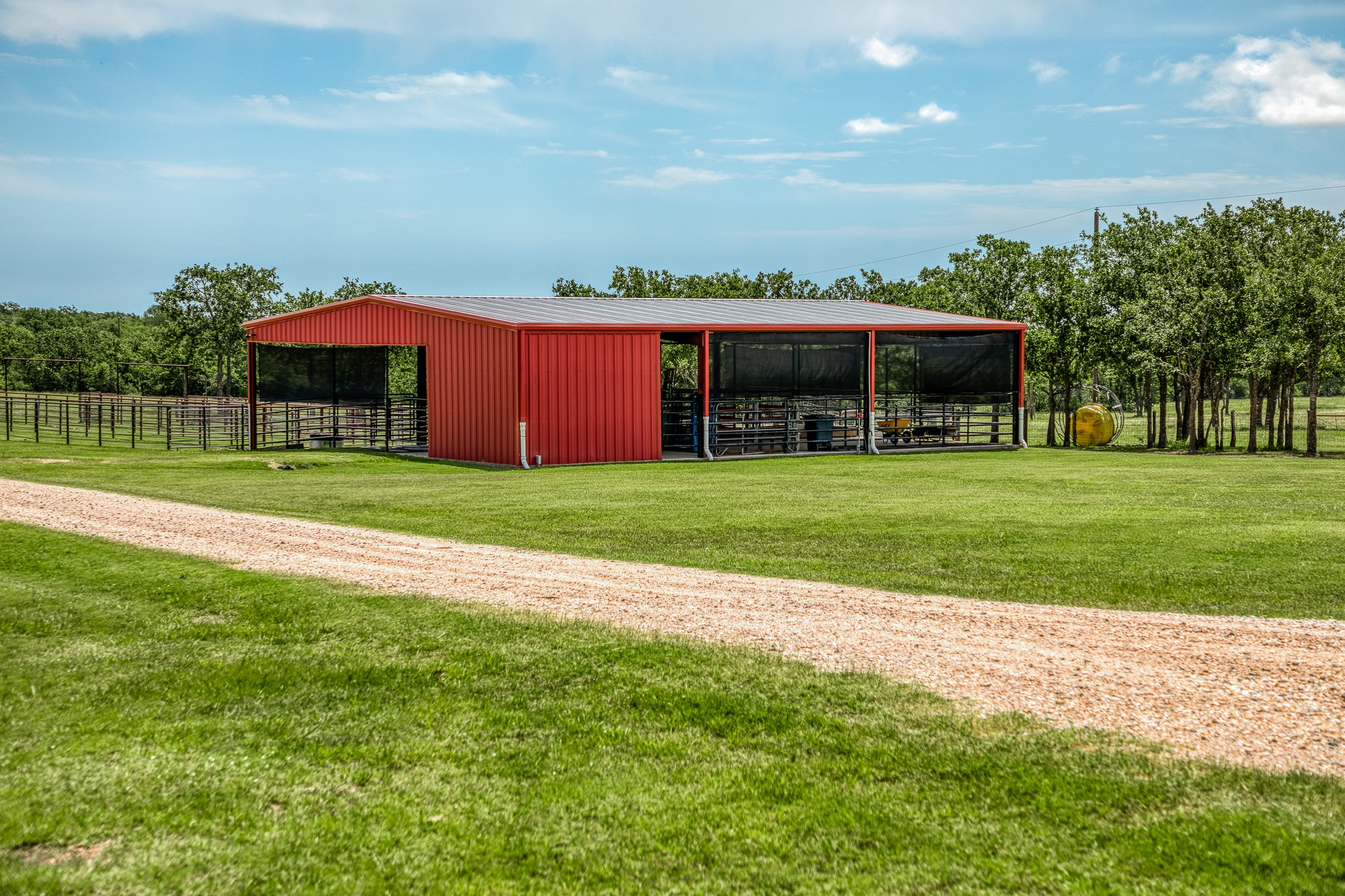 10092 County Road 446 Somerville, TX 77879 - Photo 43 of 50 a front view of a house with garden