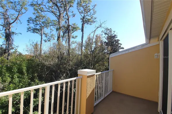a view of a wooden fence
