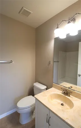a bathroom with a sink and a toilet