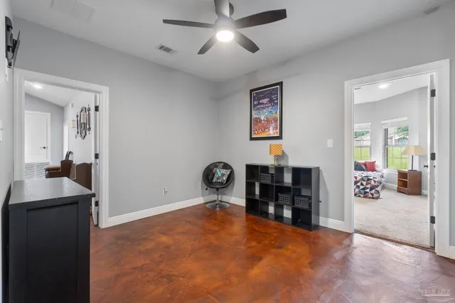 a bathroom with a granite countertop sink a mirror a bathtub and shower