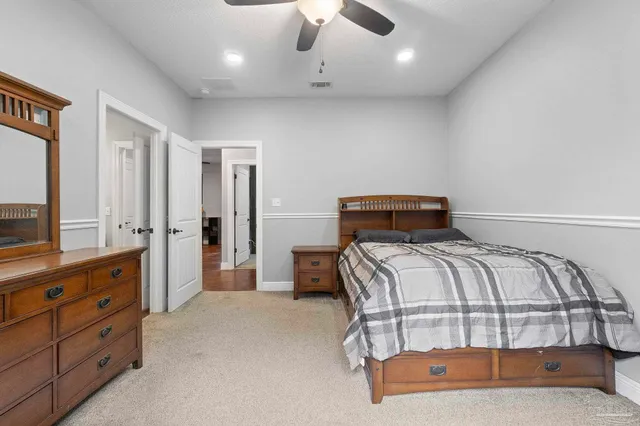 a utility room with granite countertop cabinets washer and dryer