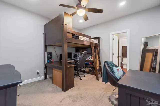a bathroom with a sink double vanity granite tub shower and a mirror