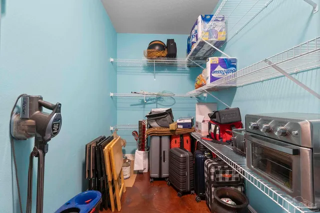 a view of a chairs and table on the wooden floor