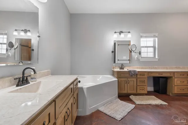 an aerial view of a house with outdoor space and street view