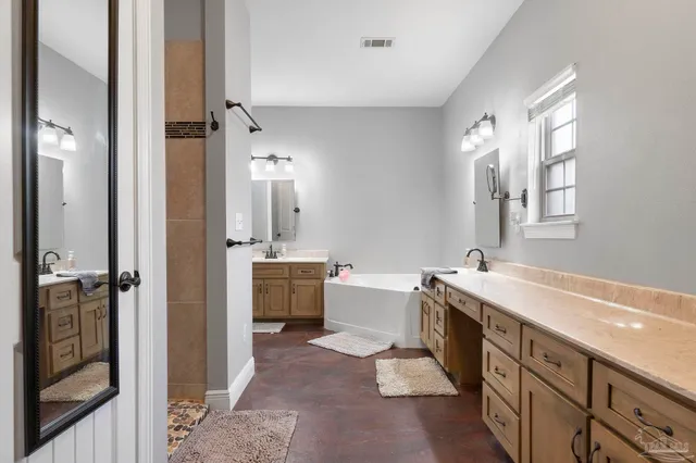 an aerial view of a house with outdoor space swimming pool and mountains