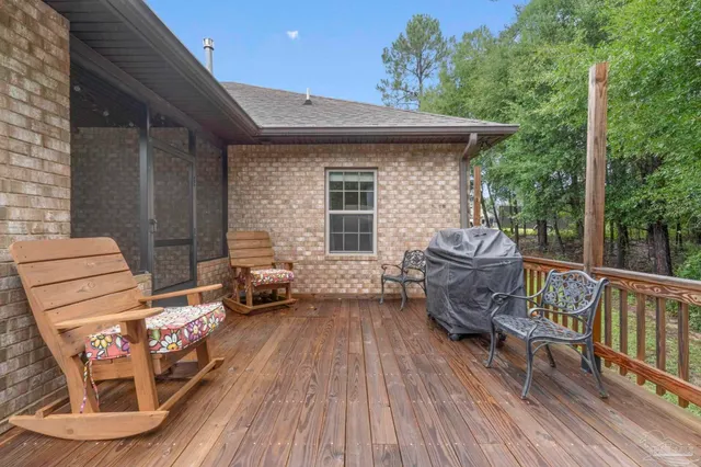 a view of a back yard of the house