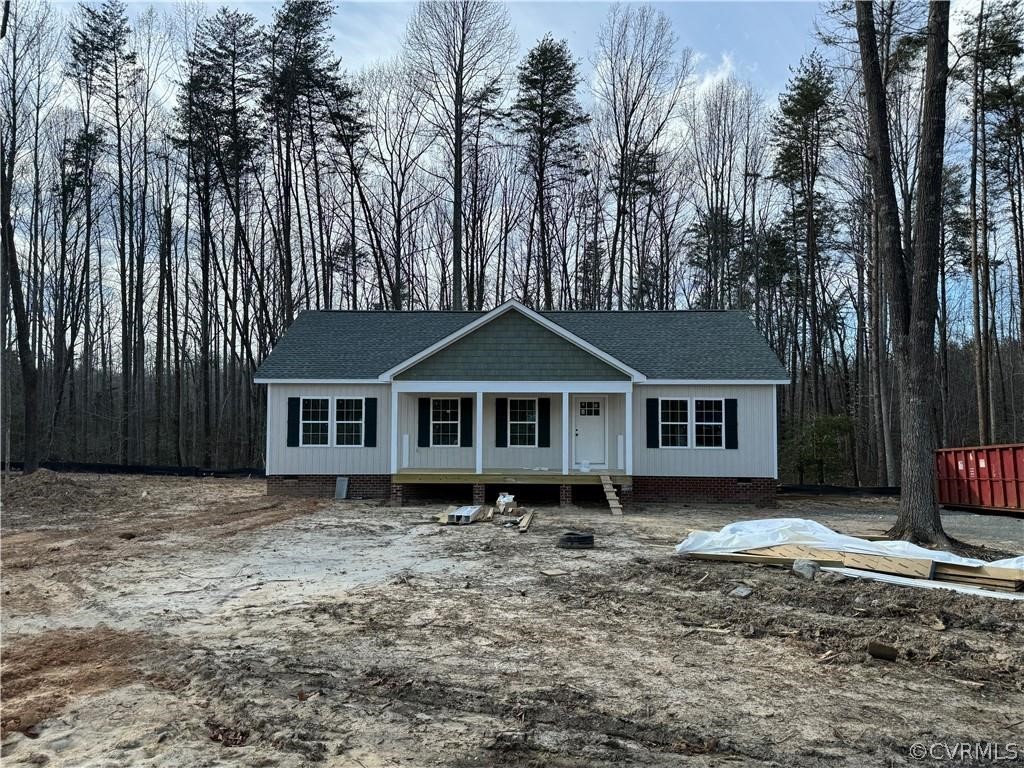 a house with trees in the background