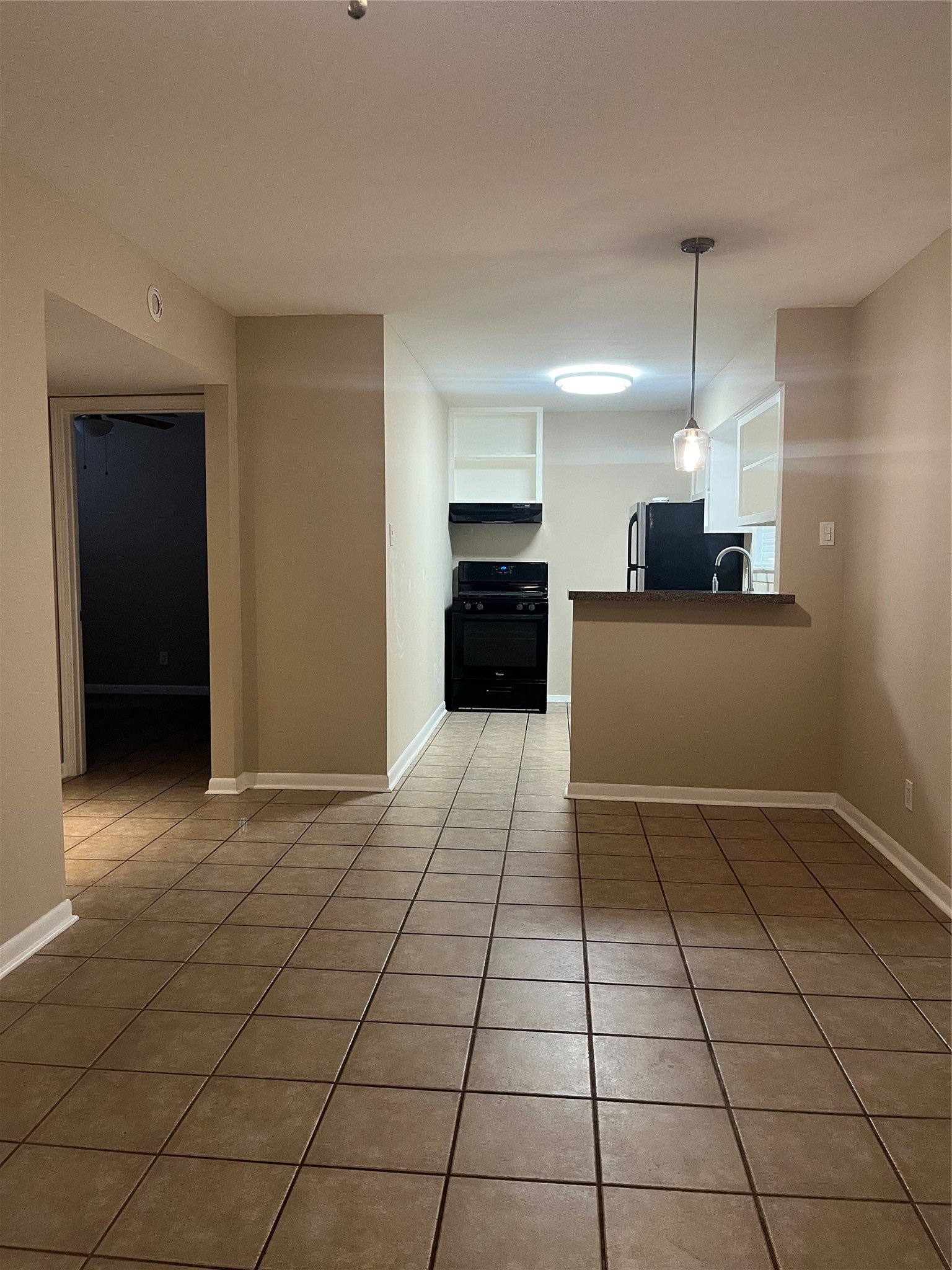 4010 Feagan Street, Unit 5 Houston, TX 77007 - Photo 11 of 11 a view of a kitchen with a sink and a refrigerator