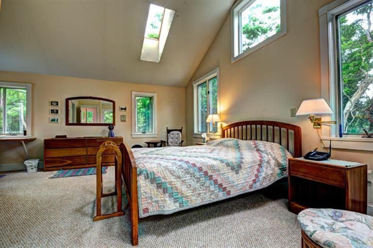 4 Stick Bridge Road Truro, MA 02666 - Photo 12 of 17 a bedroom with a bed and a window
