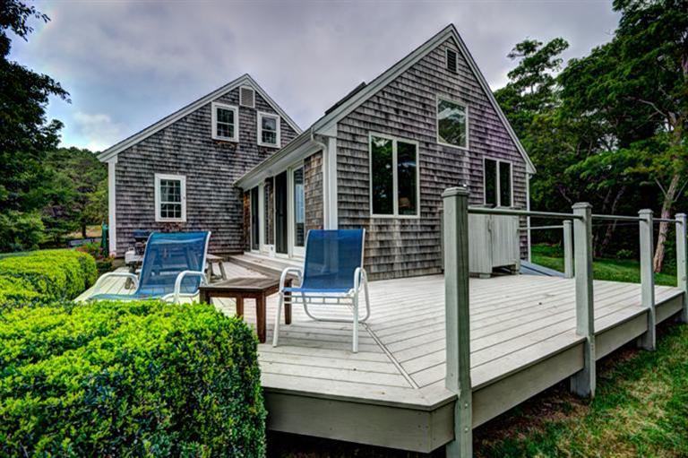 4 Stick Bridge Road Truro, MA 02666 - Photo 15 of 17 a view of a house with backyard