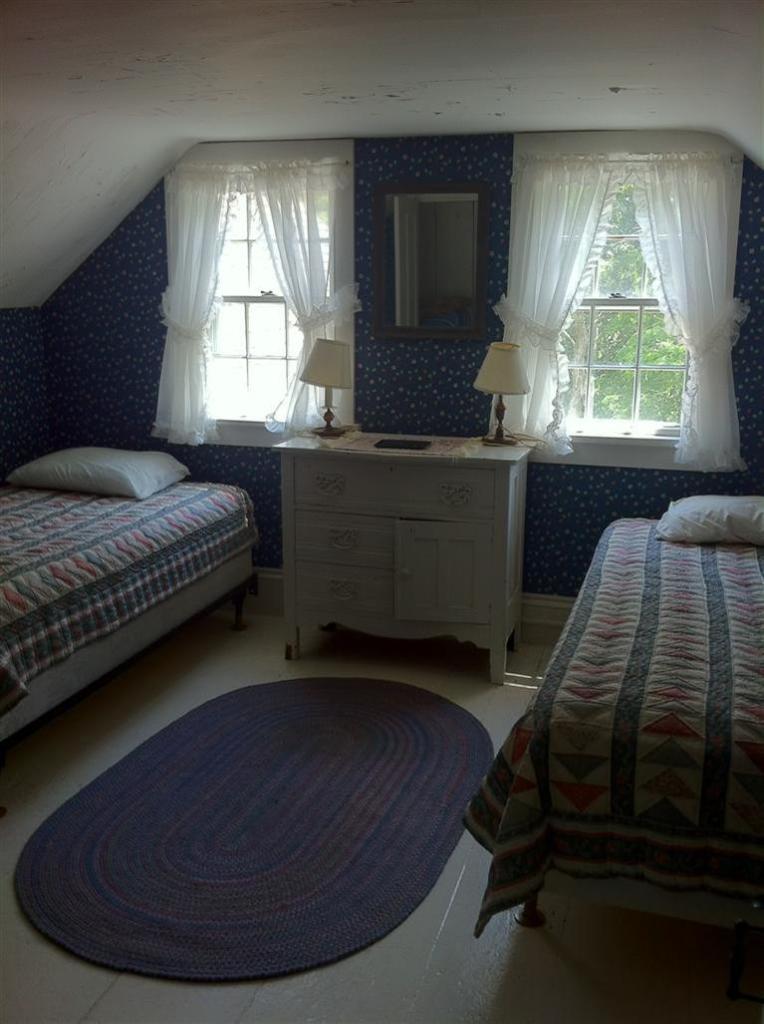 4 Stick Bridge Road Truro, MA 02666 - Photo 17 of 17 a bedroom with a bed and a window