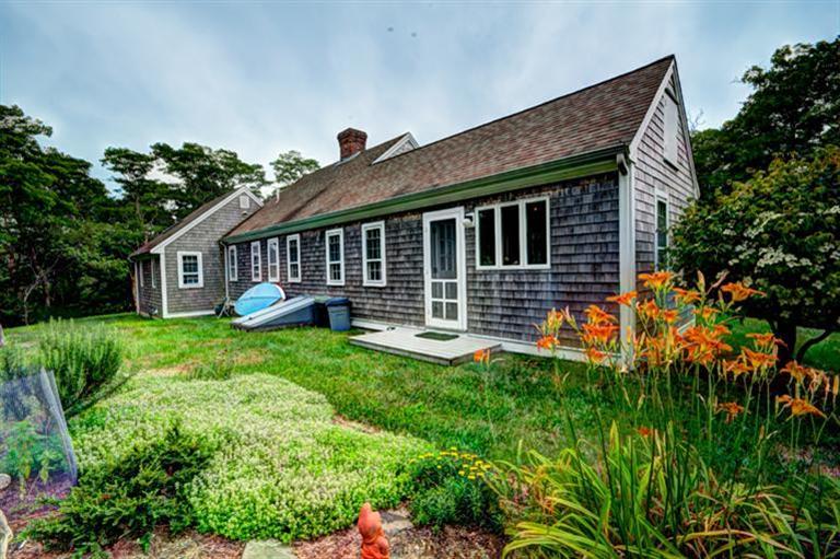 4 Stick Bridge Road Truro, MA 02666 - Photo 6 of 17 a view of a house with backyard and porch