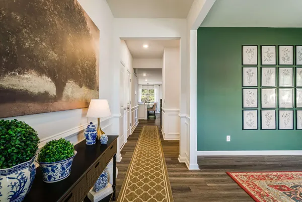 an entryway with wooden floor