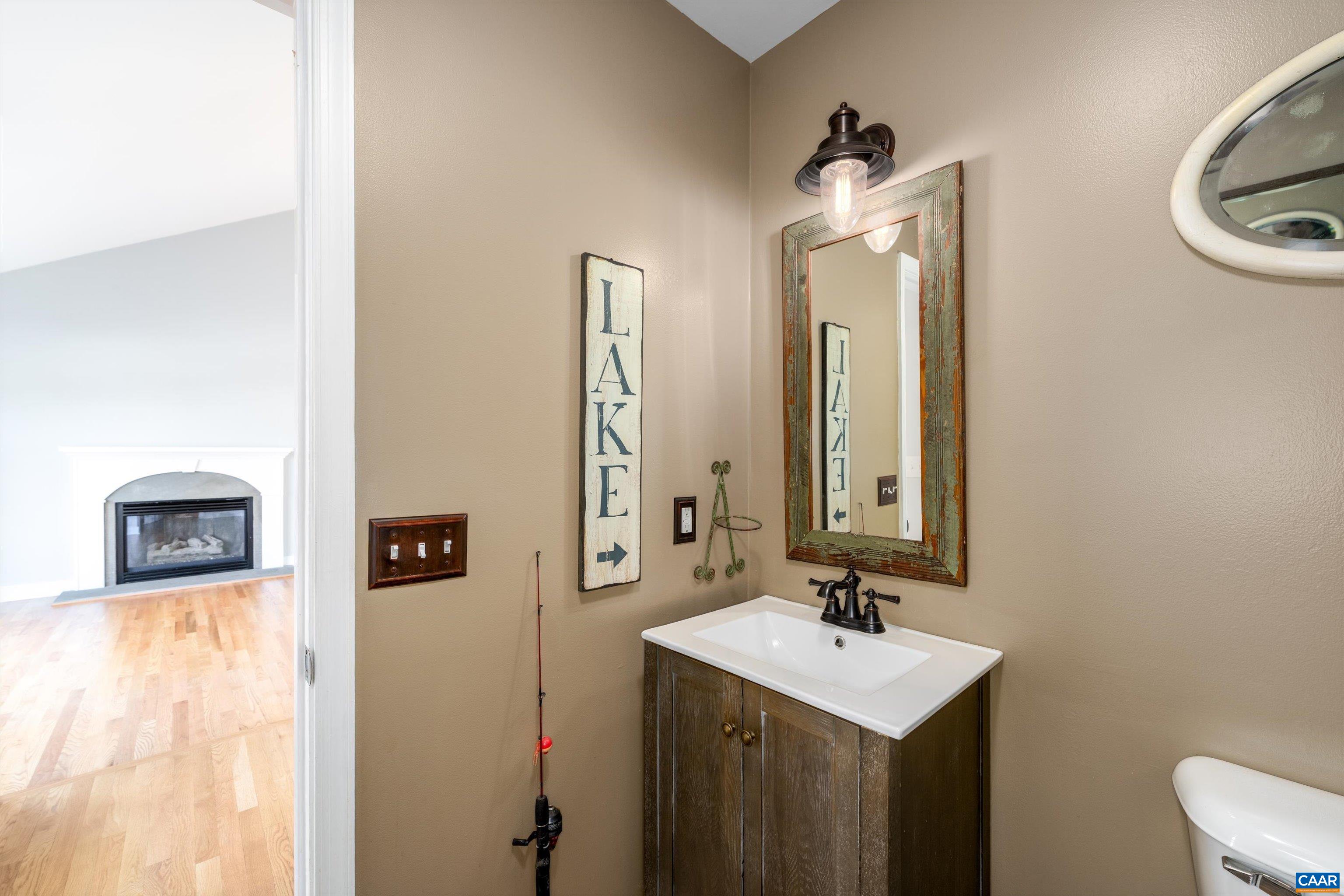 9 Vine Ridge Drive Palmyra, VA 22963 - Photo 14 of 73 a bathroom with a sink and a mirror