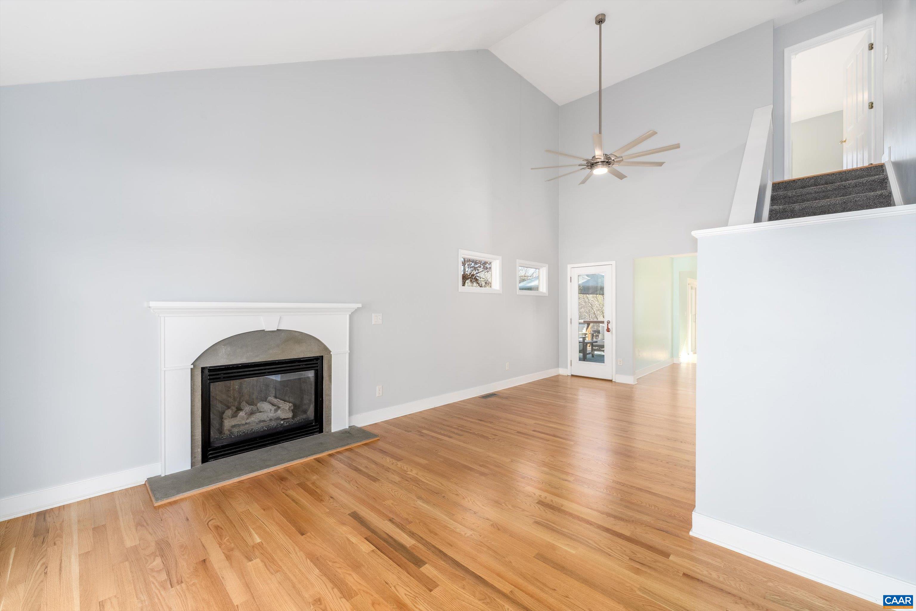 9 Vine Ridge Drive Palmyra, VA 22963 - Photo 44 of 72 a view of empty room with a fireplace and wooden floor