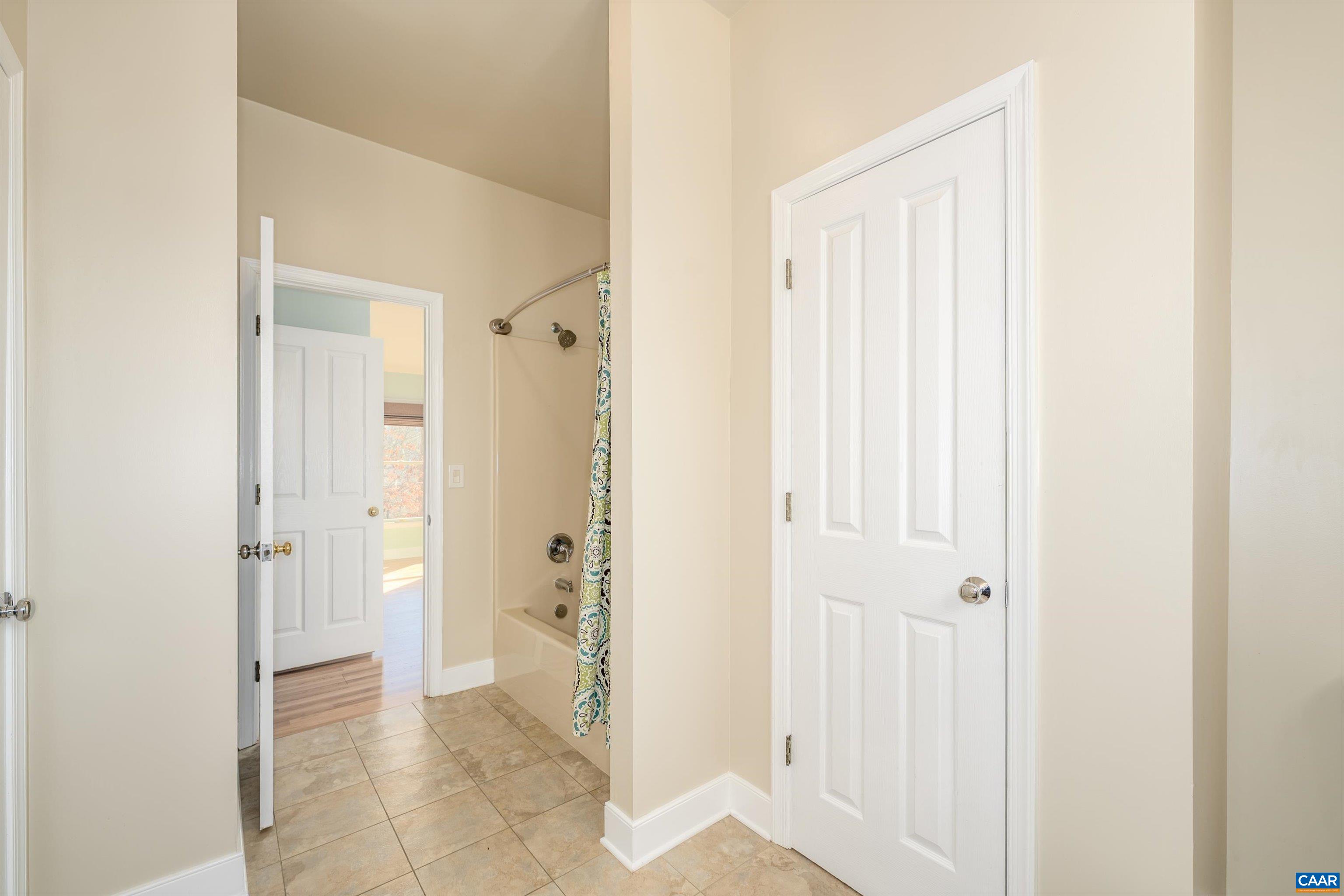 9 Vine Ridge Drive Palmyra, VA 22963 - Photo 60 of 72 a view of a bathroom with a shower and a sink