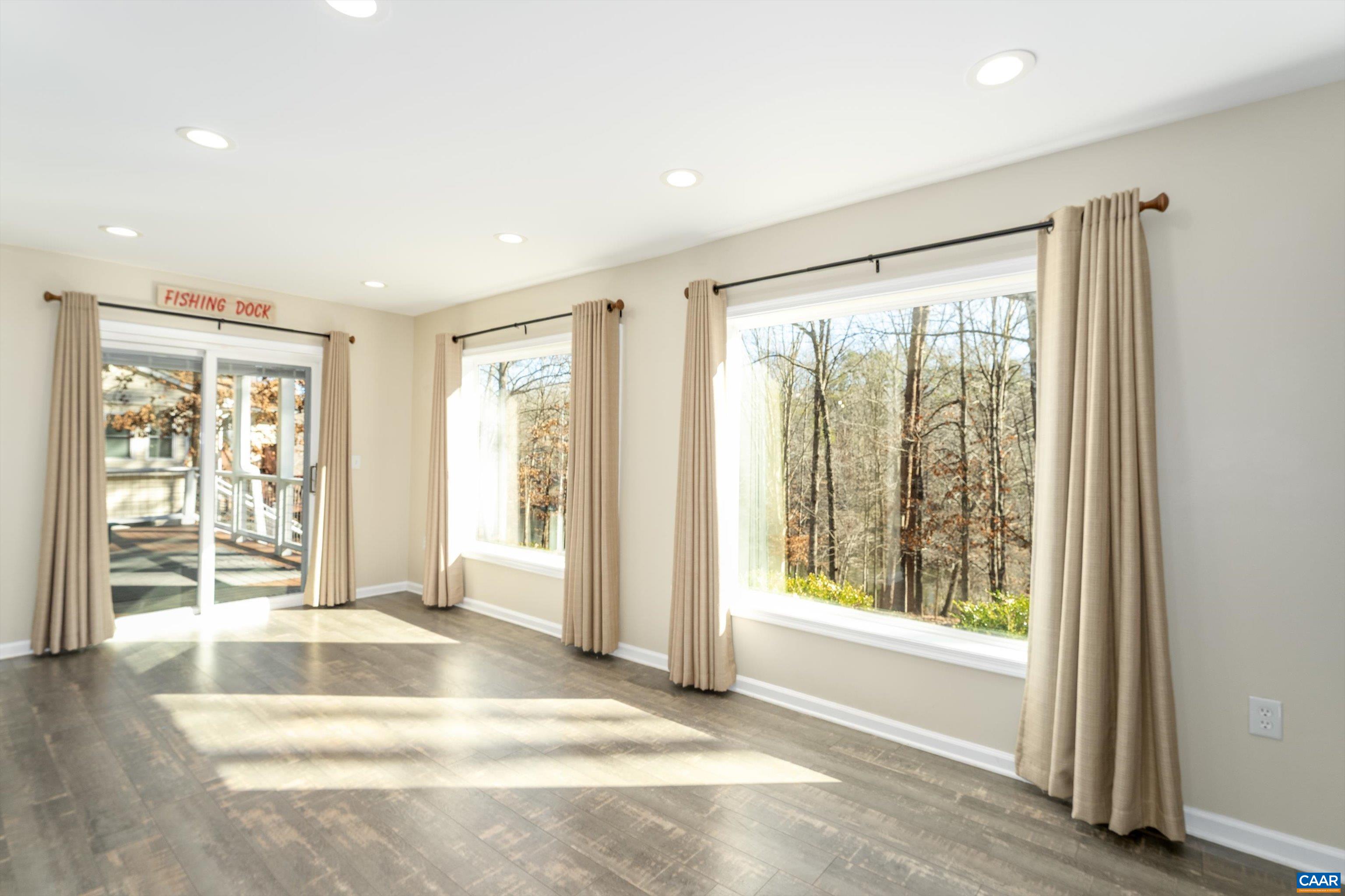 9 Vine Ridge Drive Palmyra, VA 22963 - Photo 62 of 73 a view of an empty room with wooden floor and a window