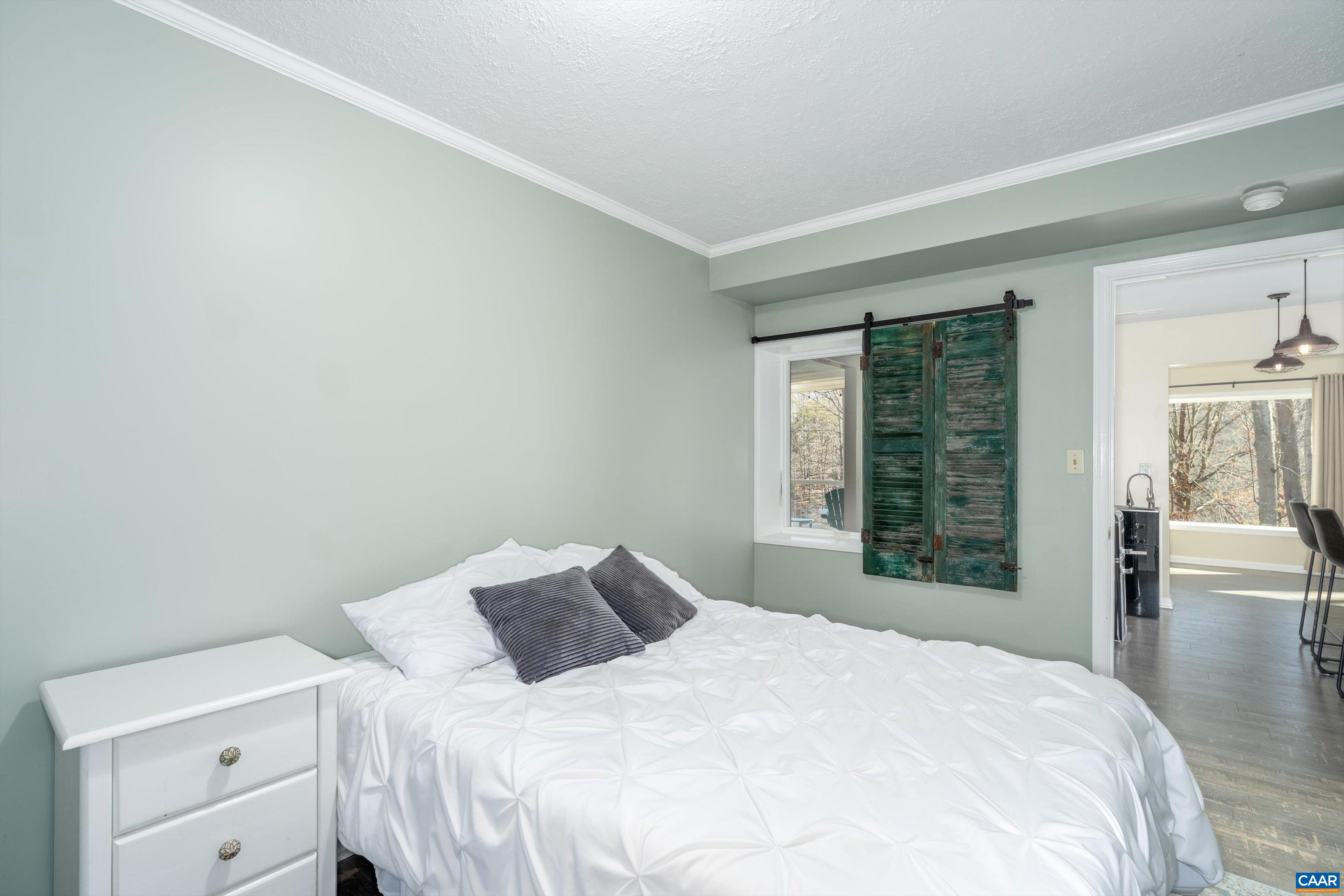 9 Vine Ridge Drive Palmyra, VA 22963 - Photo 65 of 72 a bedroom with a bed and a large window