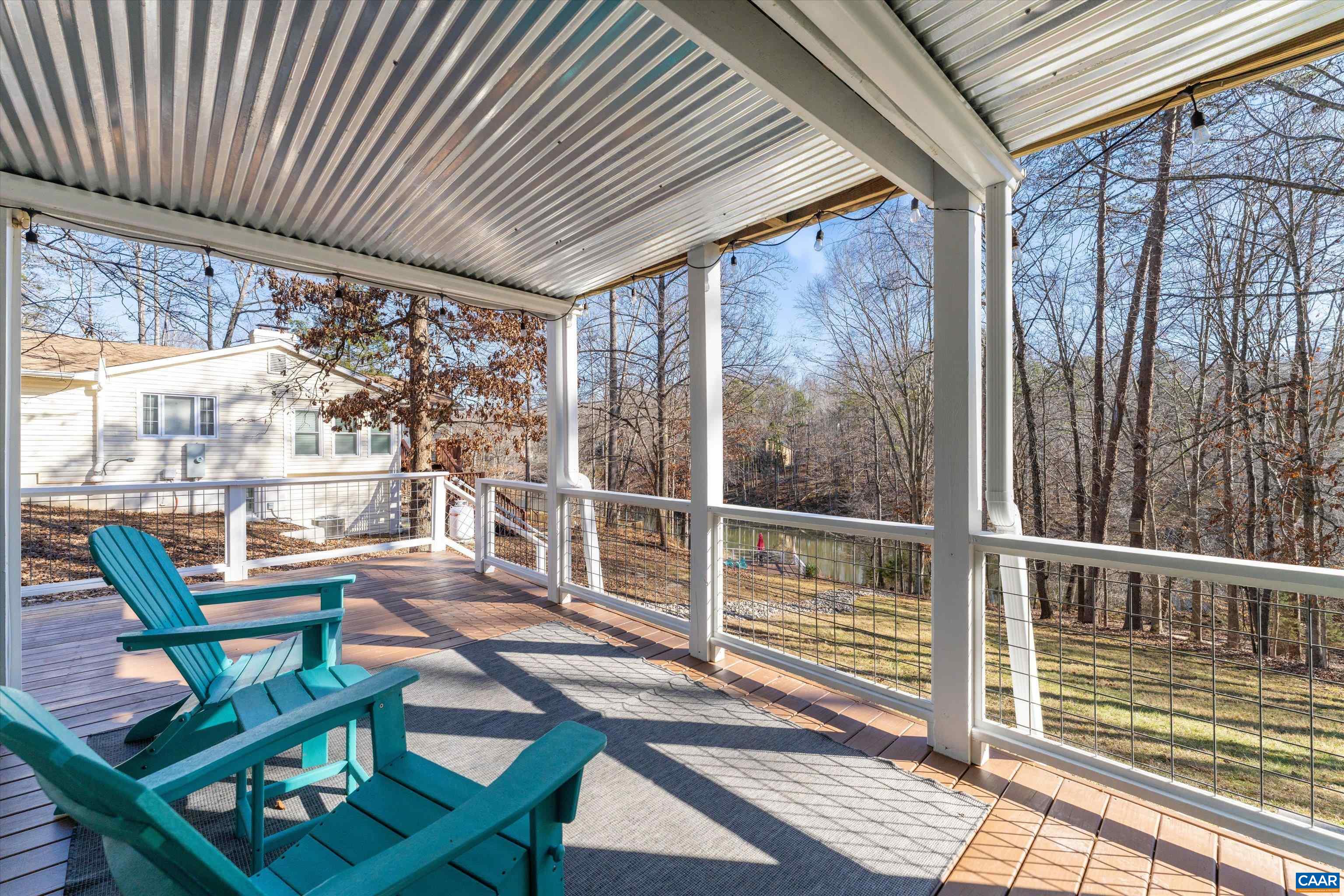 9 Vine Ridge Drive Palmyra, VA 22963 - Photo 69 of 73 a view of a chairs and table in the balcony