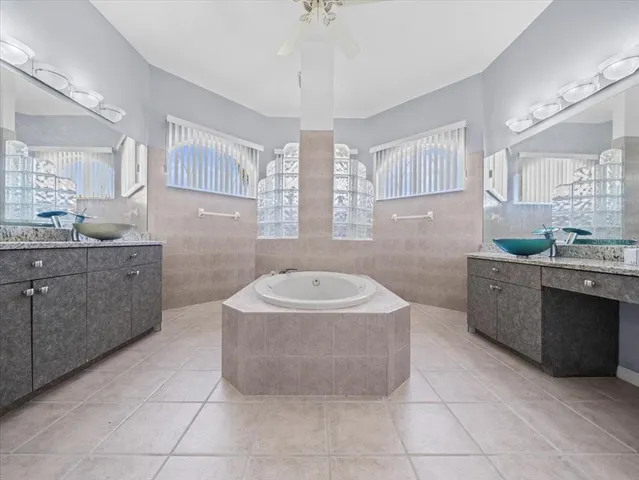 a bathroom with a bathtub and shower