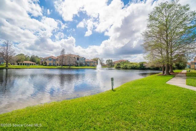 a front view of a house with a large window