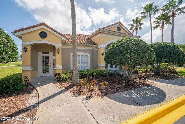 a view of a lake with a yard