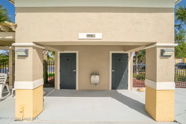 a swimming pool with wooden fence