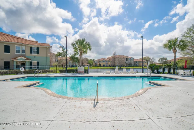 a house view with a sitting space and garden space