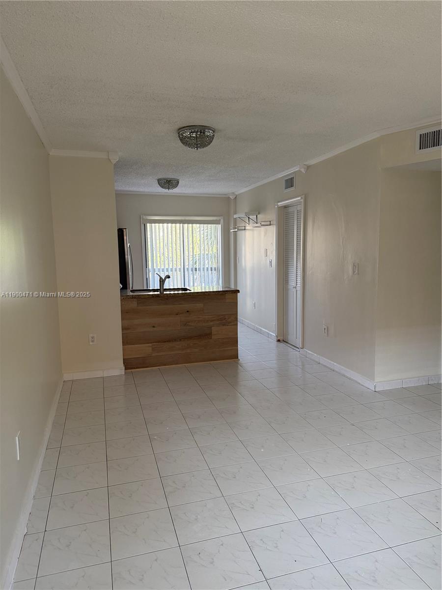 5490 West 21st Court, Unit 308 Hialeah, FL 33016 - Photo 1 of 21 a view of room and window
