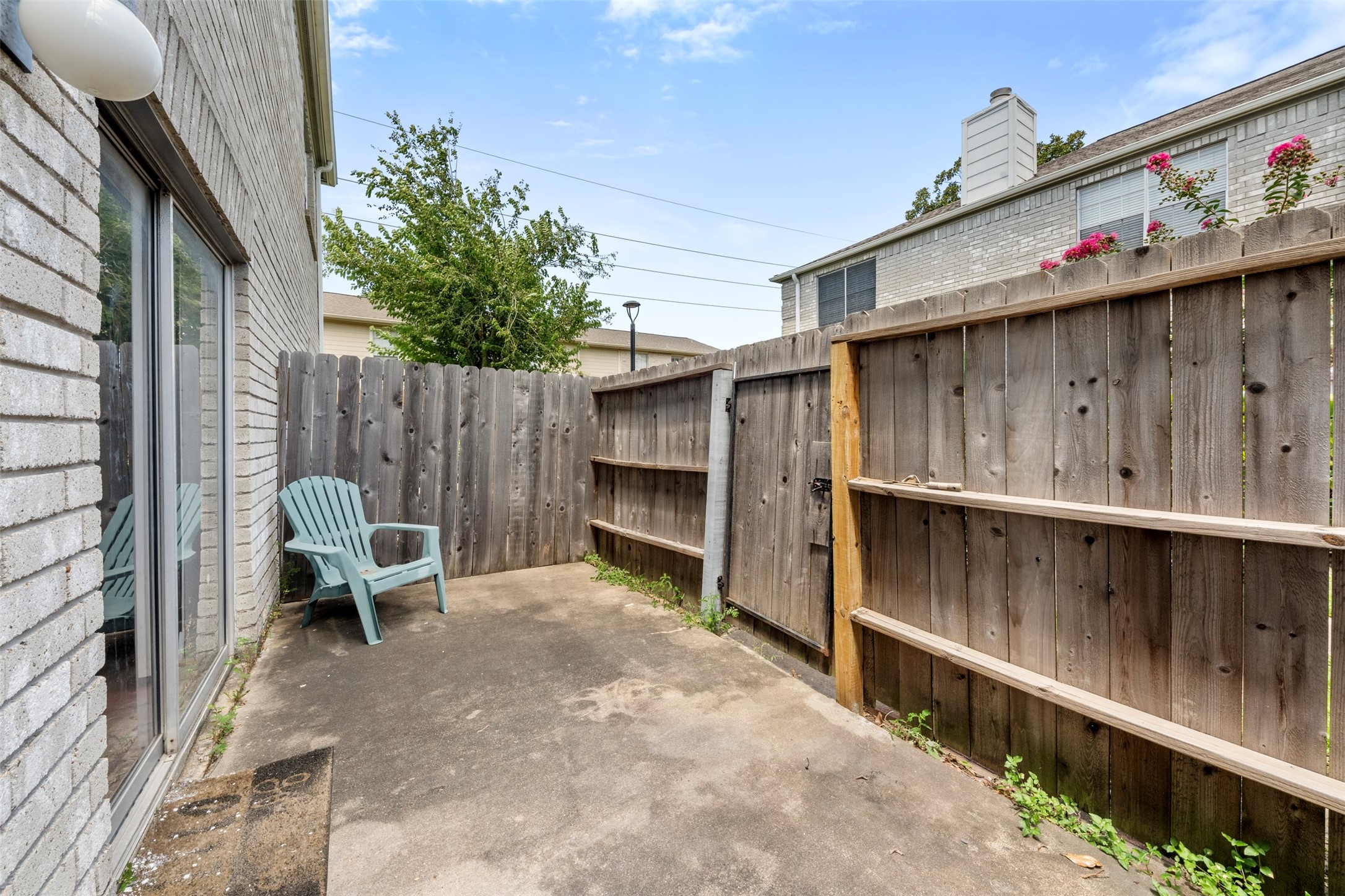 7617 Cambridge Street, Unit 7617 Houston, TX 77054 - Photo 18 of 20 a view of two chairs in patio