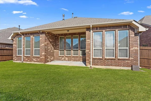 a view of a house with sitting area