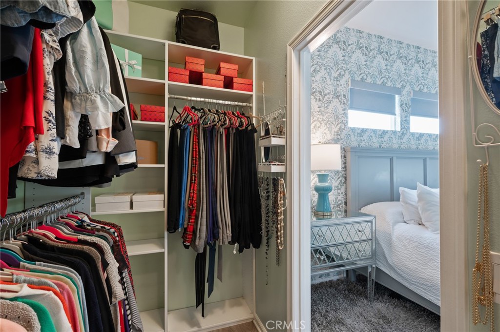 5441 Ocean, Unit 101 Hawthorne, CA 90250 - Photo 19 of 37 a view of walk in closet with clothes and shoes