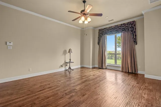 a bathroom with a granite countertop tub sink and mirror